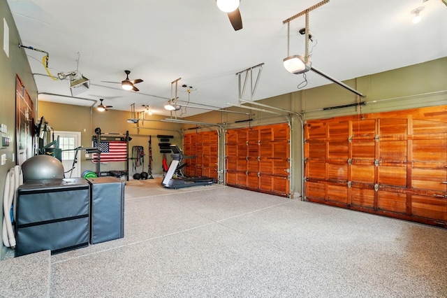 8070 Harriott Rd, Dublin, OH 43017 - garage featuring ceiling fan and a garage door opener