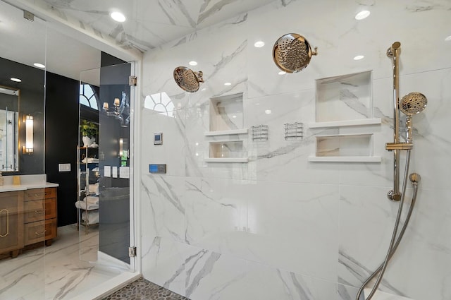 8070 Harriott Rd, Dublin, OH 43017 - bathroom with a marble finish shower, vanity, and marble tiled floors