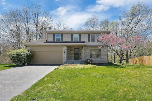 8235 Priestley Dr, Reynoldsburg, OH 43068 - traditional-style house featuring stone siding, asphalt driveway, and a chimney