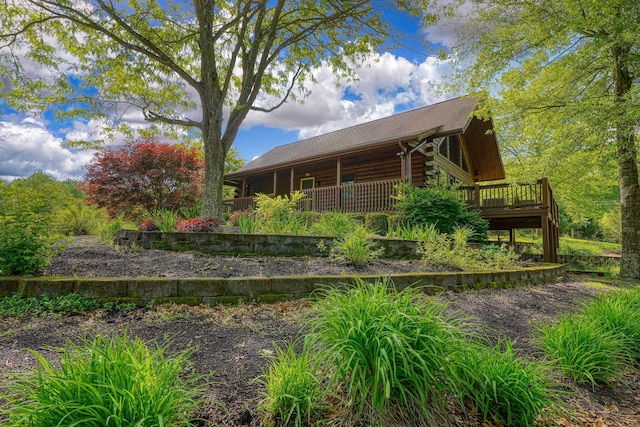 view of home's exterior featuring log exterior
