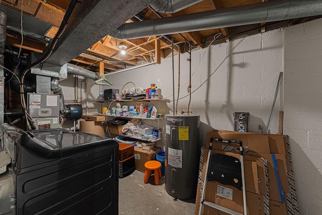 unfinished basement featuring water heater, washer / dryer, concrete block wall, and heating unit