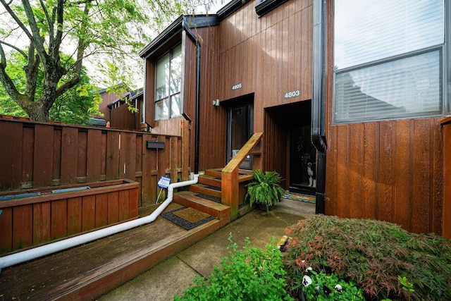 property entrance with fence