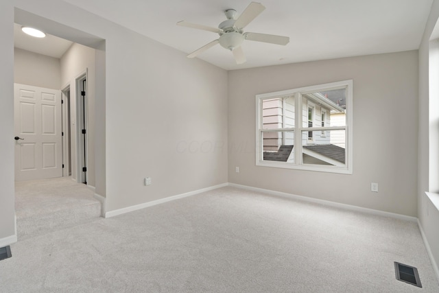 411 Reinhard Ave, Columbus, OH 43206 - empty room featuring carpet flooring, baseboards, and ceiling fan