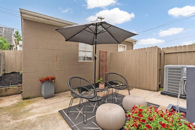 411 Reinhard Ave, Columbus, OH 43206 - view of patio featuring central air condition unit and fence