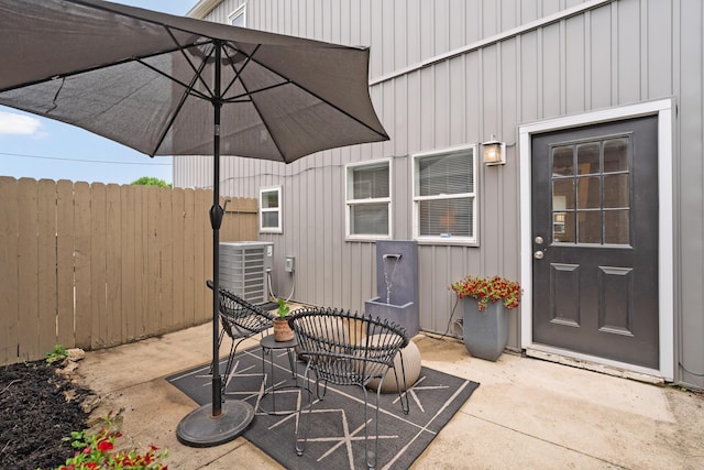 411 Reinhard Ave, Columbus, OH 43206 - view of patio featuring fence, outdoor dining area, and central air condition unit