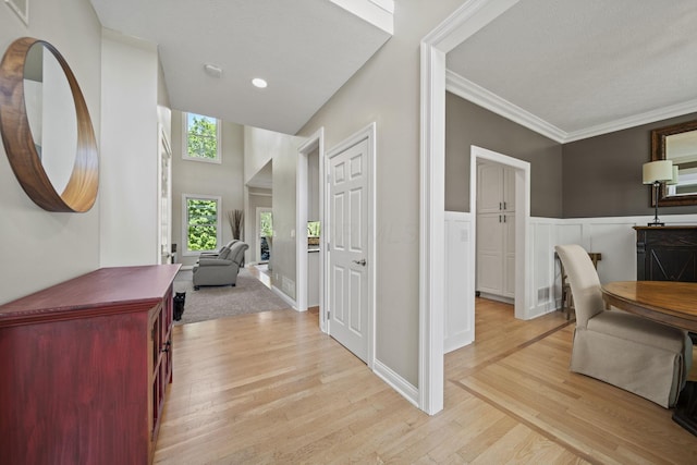 2557 Coltsbridge Dr, Lewis Center, OH 43035 - hall featuring light wood-type flooring and crown molding
