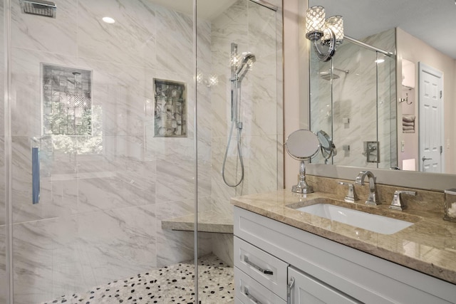 2557 Coltsbridge Dr, Lewis Center, OH 43035 - full bathroom featuring a marble finish shower and vanity
