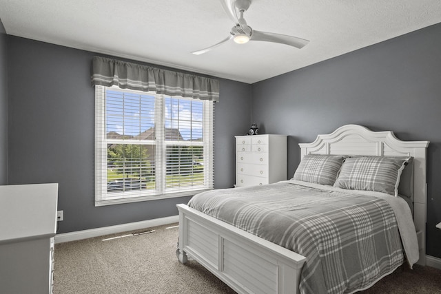 2557 Coltsbridge Dr, Lewis Center, OH 43035 - carpeted bedroom with baseboards and ceiling fan