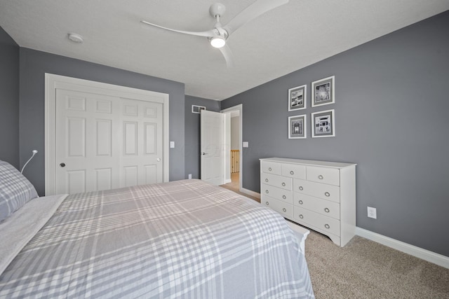 2557 Coltsbridge Dr, Lewis Center, OH 43035 - carpeted bedroom with a closet, baseboards, and a ceiling fan