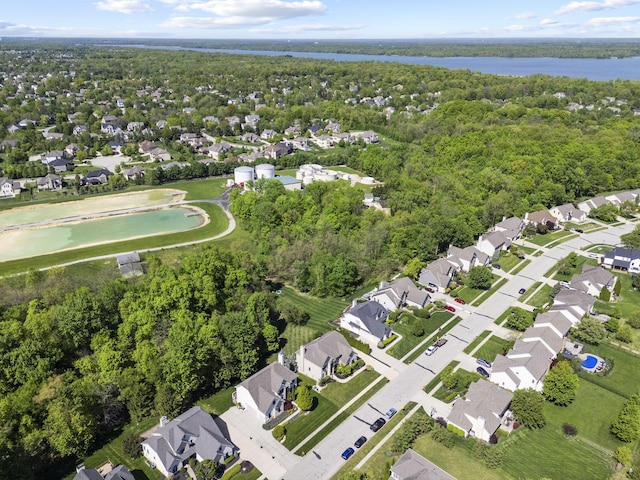 2557 Coltsbridge Dr, Lewis Center, OH 43035 - view of property location with nearby suburban area, a nearby body of water, and a forest