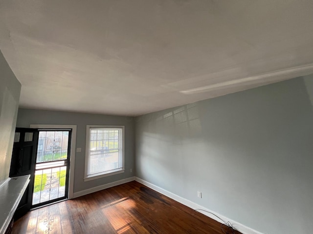 155 Schultz Ave, Columbus, OH 43222 - spare room featuring baseboards and dark wood finished floors