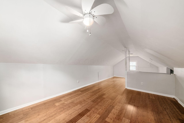 263 E Beaumont Rd, Columbus, OH 43214 - bonus room with vaulted ceiling, baseboards, wood finished floors, and ceiling fan