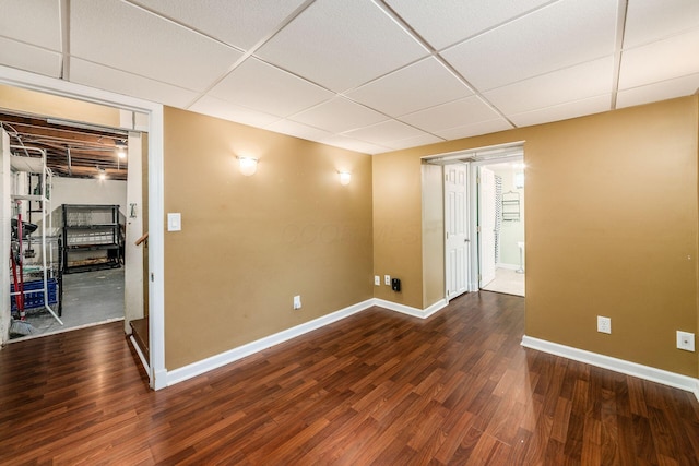263 E Beaumont Rd, Columbus, OH 43214 - unfurnished room with wood finished floors, baseboards, and a paneled ceiling