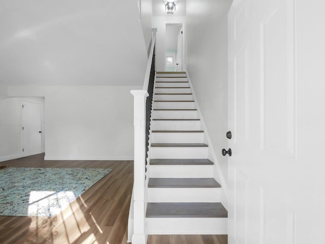 4838 Calvin Dr, Columbus, OH 43227 - stairway featuring wood finished floors and baseboards