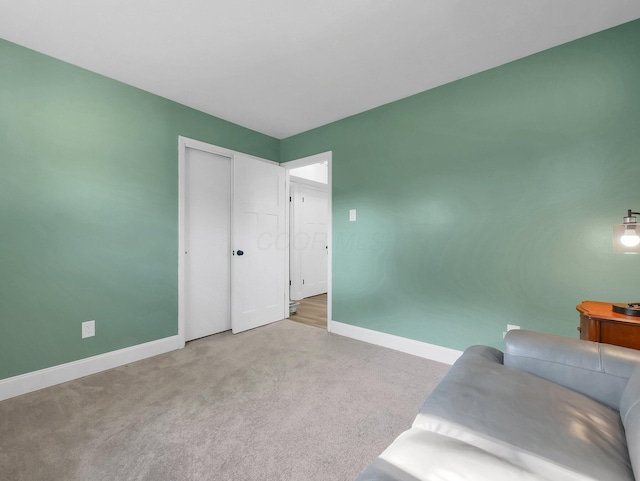 4838 Calvin Dr, Columbus, OH 43227 - living area with baseboards and carpet floors