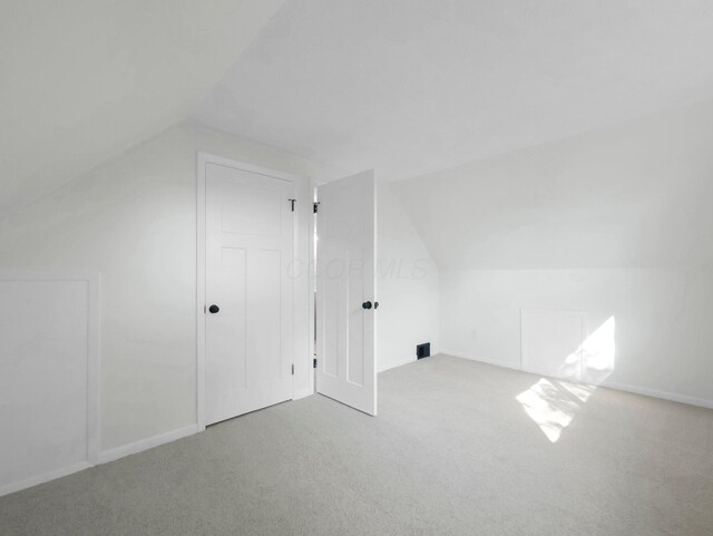4838 Calvin Dr, Columbus, OH 43227 - additional living space featuring carpet floors, lofted ceiling, and baseboards