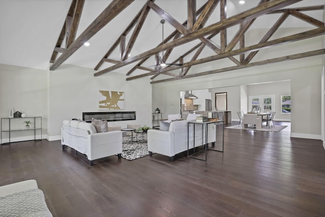 2727 Westmont Blvd, Columbus, OH 43221 - living area with high vaulted ceiling, baseboards, beam ceiling, dark wood-style flooring, and recessed lighting