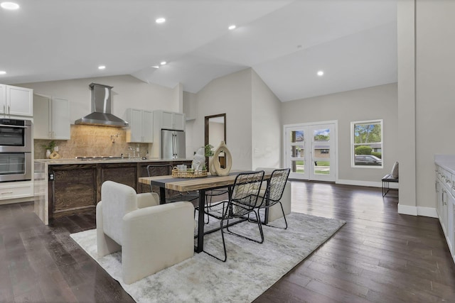 2727 Westmont Blvd, Columbus, OH 43221 - dining space with vaulted ceiling, dark wood-type flooring, recessed lighting, and baseboards
