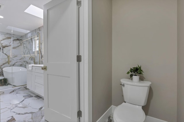 2727 Westmont Blvd, Columbus, OH 43221 - bathroom with a marble finish shower, vanity, baseboards, toilet, and marble finish flooring