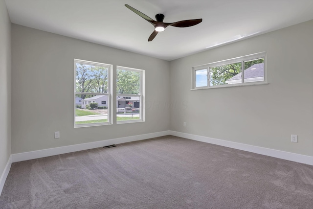 2727 Westmont Blvd, Columbus, OH 43221 - empty room featuring carpet floors, baseboards, and a ceiling fan