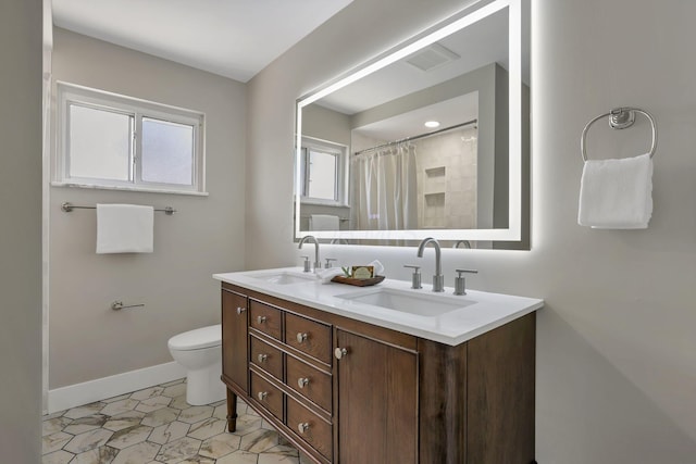 2727 Westmont Blvd, Columbus, OH 43221 - bathroom featuring baseboards, toilet, double vanity, and a shower with shower curtain