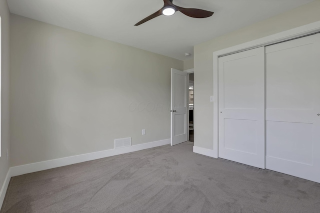 2727 Westmont Blvd, Columbus, OH 43221 - unfurnished bedroom with carpet floors, baseboards, a closet, and a ceiling fan