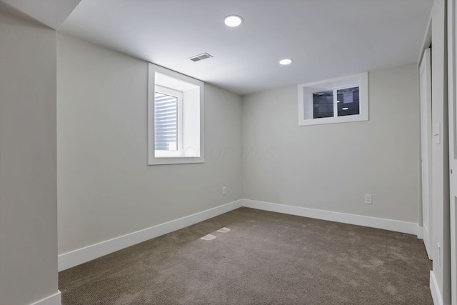 2727 Westmont Blvd, Columbus, OH 43221 - below grade area featuring dark carpet, baseboards, and recessed lighting