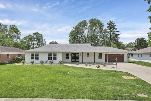 2727 Westmont Blvd, Columbus, OH 43221 - ranch-style house featuring concrete driveway, a garage, and a front yard