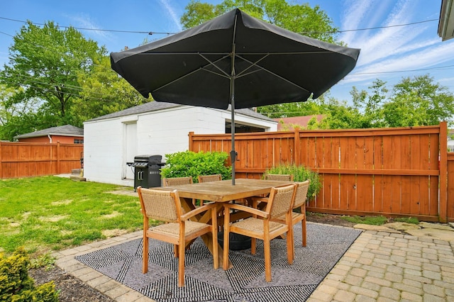 view of patio / terrace featuring a grill and outdoor dining area