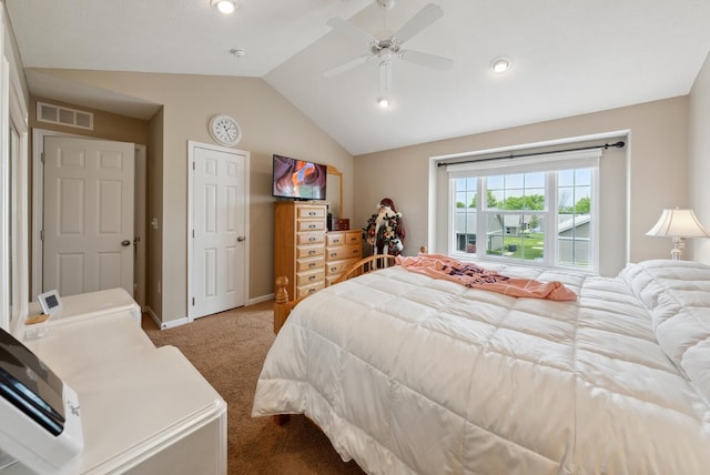 bedroom featuring carpet flooring, vaulted ceiling, baseboards, and a ceiling fan