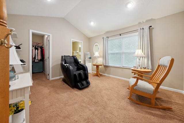 sitting room with vaulted ceiling, carpet flooring, baseboards, and recessed lighting