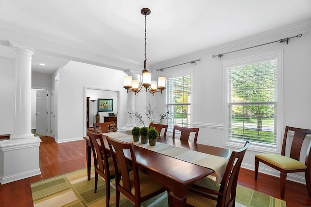6415 Green Stone Loop, Dublin, OH 43016 - dining room featuring decorative columns, light wood-type flooring, a chandelier, ornamental molding, and baseboards