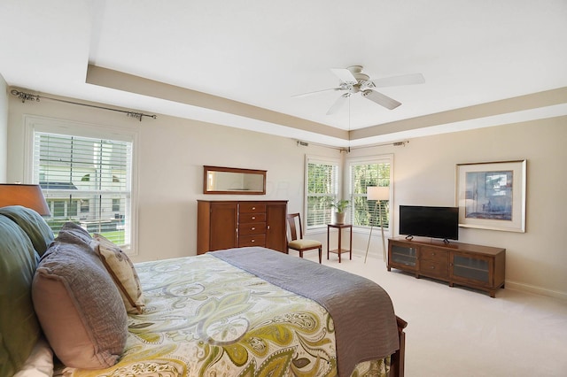 6415 Green Stone Loop, Dublin, OH 43016 - carpeted bedroom with multiple windows, baseboards, a raised ceiling, and ceiling fan