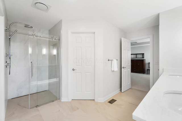 6415 Green Stone Loop, Dublin, OH 43016 - full bath with a shower stall, marble finish floors, double vanity, and baseboards