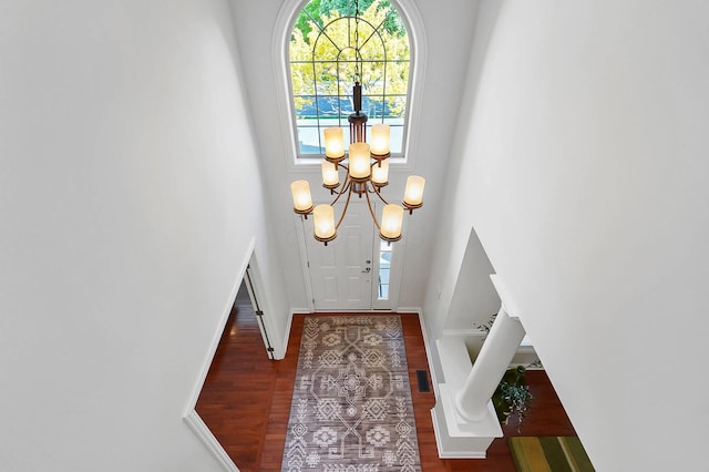 6415 Green Stone Loop, Dublin, OH 43016 - entryway with a chandelier, wood finished floors, and baseboards