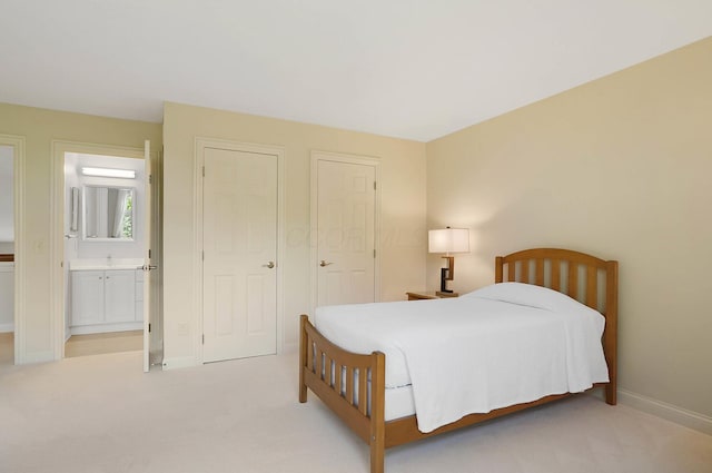 6415 Green Stone Loop, Dublin, OH 43016 - bedroom with light colored carpet, baseboards, and ensuite bath