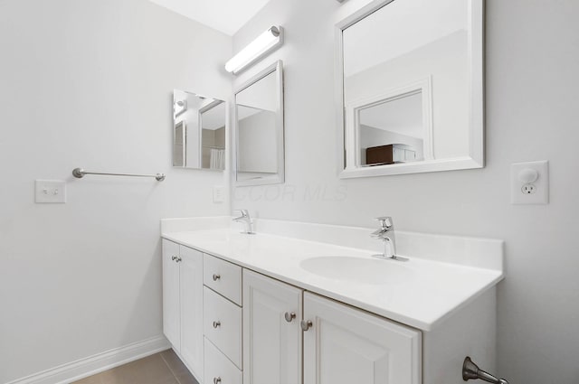 6415 Green Stone Loop, Dublin, OH 43016 - full bath featuring double vanity, tile patterned flooring, and baseboards