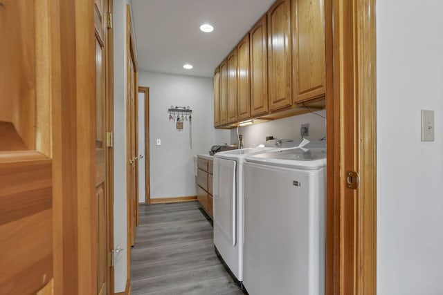 1719 Marion Rd NW, Utica, OH 43080 - laundry room featuring cabinet space, independent washer and dryer, light wood-style flooring, recessed lighting, and baseboards