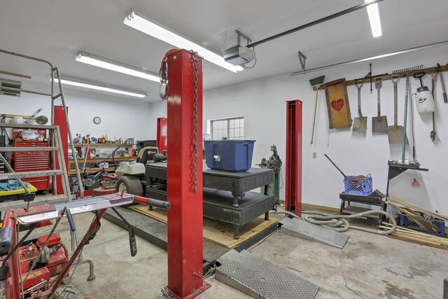 1719 Marion Rd NW, Utica, OH 43080 - garage featuring a garage door opener and a workshop area