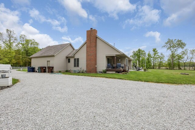 1719 Marion Rd NW, Utica, OH 43080 - rear view of property with driveway, a chimney, and a lawn