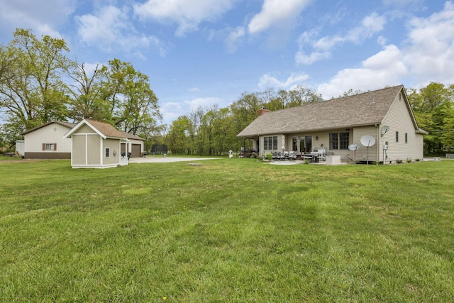 1719 Marion Rd NW, Utica, OH 43080 - view of grassy yard with a patio area