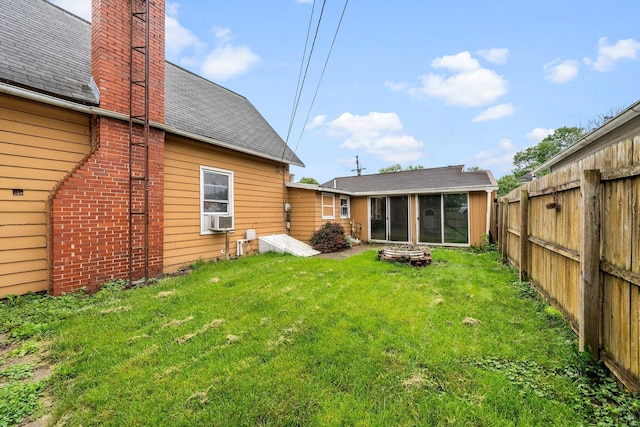 616 E Chestnut St, Mount Vernon, OH 43050 - rear view of property with a shingled roof, a sunroom, a chimney, and cooling unit