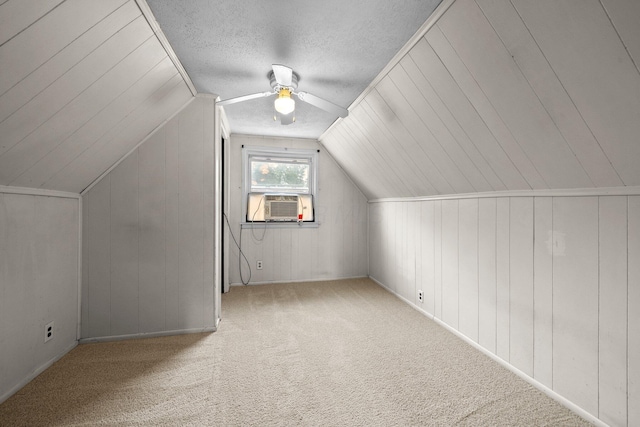 616 E Chestnut St, Mount Vernon, OH 43050 - bonus room with ceiling fan, carpet flooring, cooling unit, vaulted ceiling, and a textured ceiling