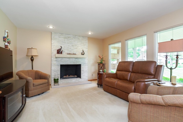 316 Charleston Ave, Columbus, OH 43214 - living area with light colored carpet, a stone fireplace, and recessed lighting
