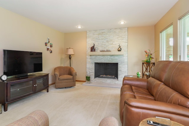 316 Charleston Ave, Columbus, OH 43214 - carpeted living area with a fireplace, baseboards, and recessed lighting