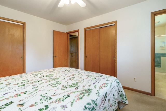 316 Charleston Ave, Columbus, OH 43214 - bedroom with light carpet, baseboards, ensuite bathroom, and a ceiling fan