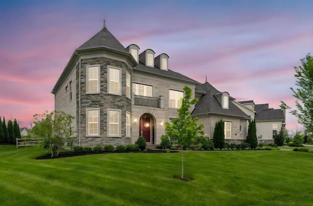 6540 Marshview Dr, Hilliard, OH 43026 - french provincial home with a balcony, stone siding, and a front yard