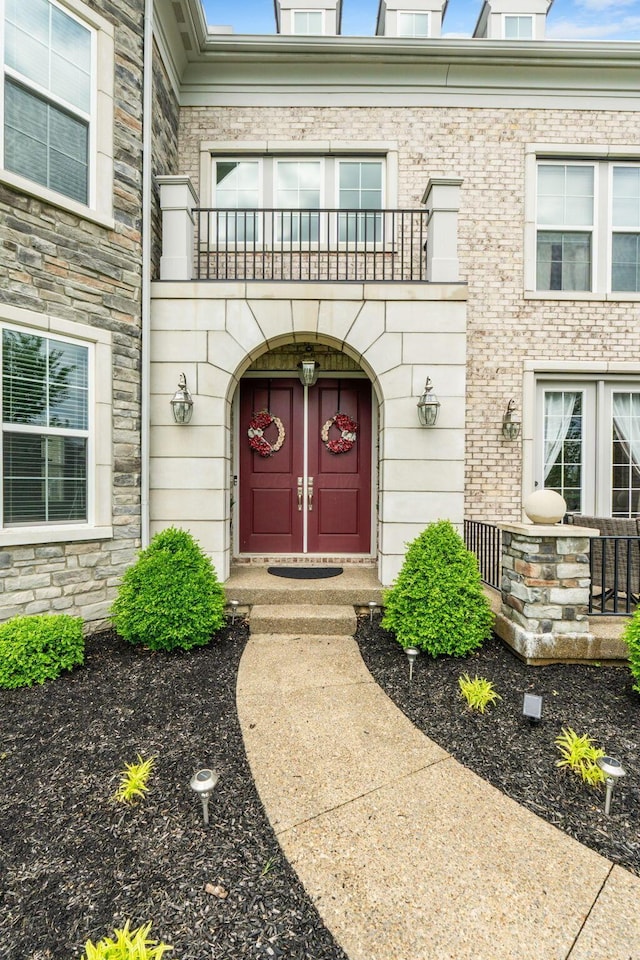 6540 Marshview Dr, Hilliard, OH 43026 - doorway to property featuring a balcony and stone siding