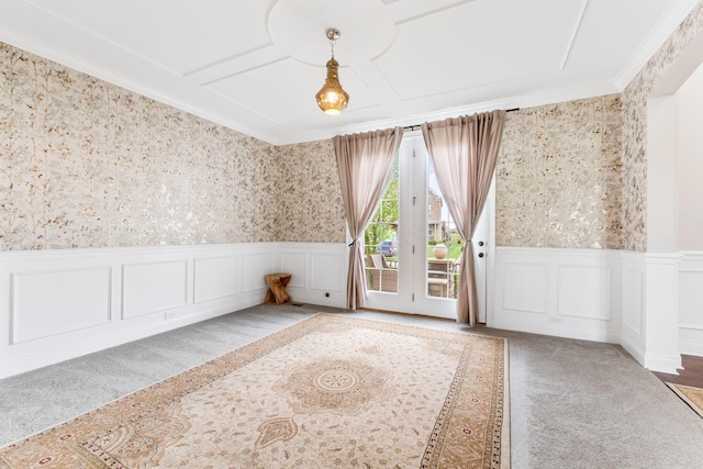 6540 Marshview Dr, Hilliard, OH 43026 - empty room featuring wallpapered walls, carpet, crown molding, wainscoting, and a decorative wall