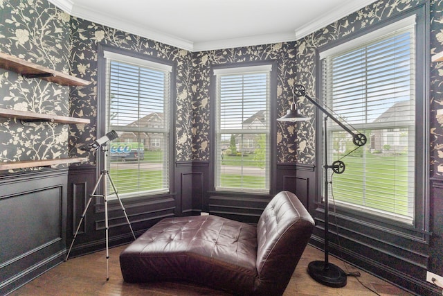 6540 Marshview Dr, Hilliard, OH 43026 - living area with wallpapered walls, a wainscoted wall, wood finished floors, and ornamental molding